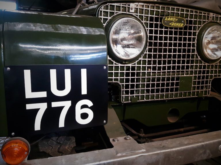 From sign writing videos LUI 776 hand painted number plate fitted at the front of an early Land-Rover