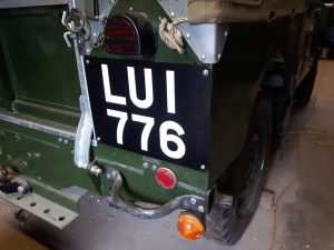 https://wwwFrom sign writing videos LUI 776 signwritten number plate fitted to the rear of early lights through the grill Land-Rover