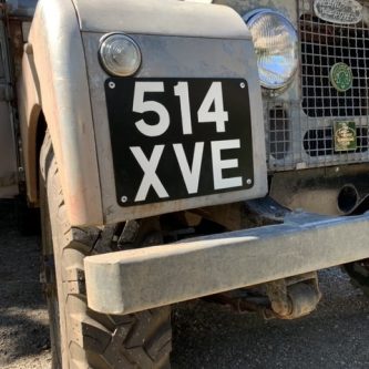 Early Land Rover with hand-painted number-plate