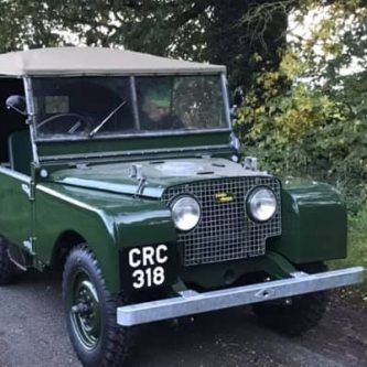 Number-plate fitted to front of early 80 inch Land-Rover