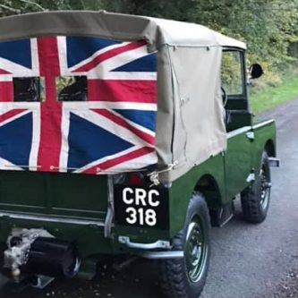 Number-plates fitted to rear of early 80 inch Land-Rover