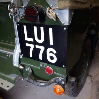 https://wwwFrom sign writing videos LUI 776 signwritten number plate fitted to the rear of early lights through the grill Land-Rover